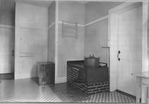 SA0472 - Photo of a room located near a refectory. Details include a wood box and dumbwaiter to the left. Associated with the Church Family. Identified on the back.